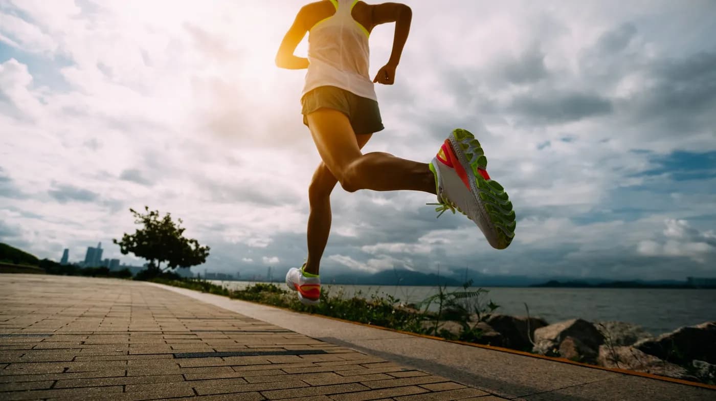 Woman running outdoors in the morning for fitness and marathon training