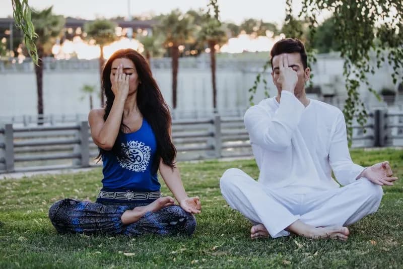 caucasian man and latin woman meditate in a park i 2026 01 06 09 41 08 utc 1 1