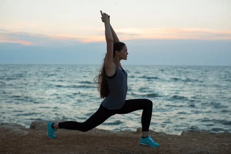 caucasian-woman-practicing-yoga-at-seashore-of-oce-2026-01-07-05-41-03-utc.jpg