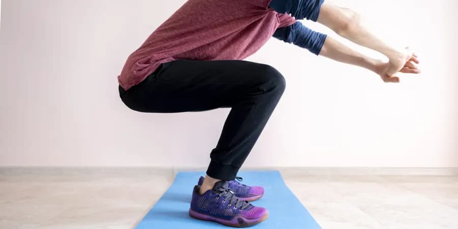 How to Do a Proper Squat: Form, Mistakes and Progressions