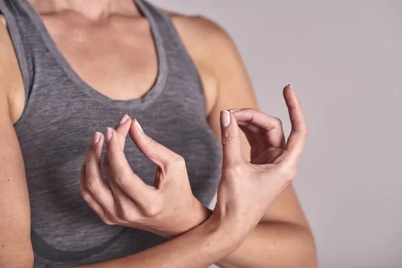 cropped shot of woman meditating with fingers toge 2026 01 05 23 33 50 utc 1