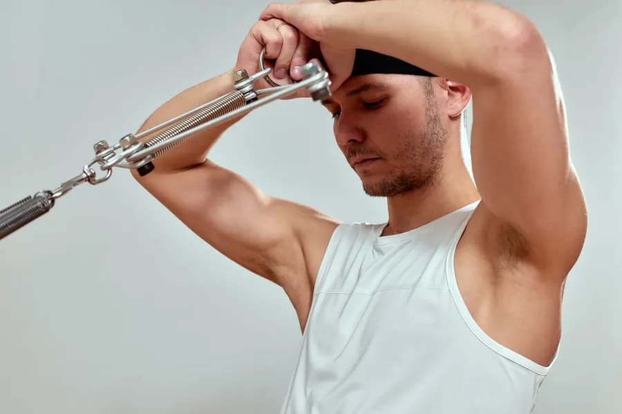 Man training in the gym, representing the face pull shoulder exercise