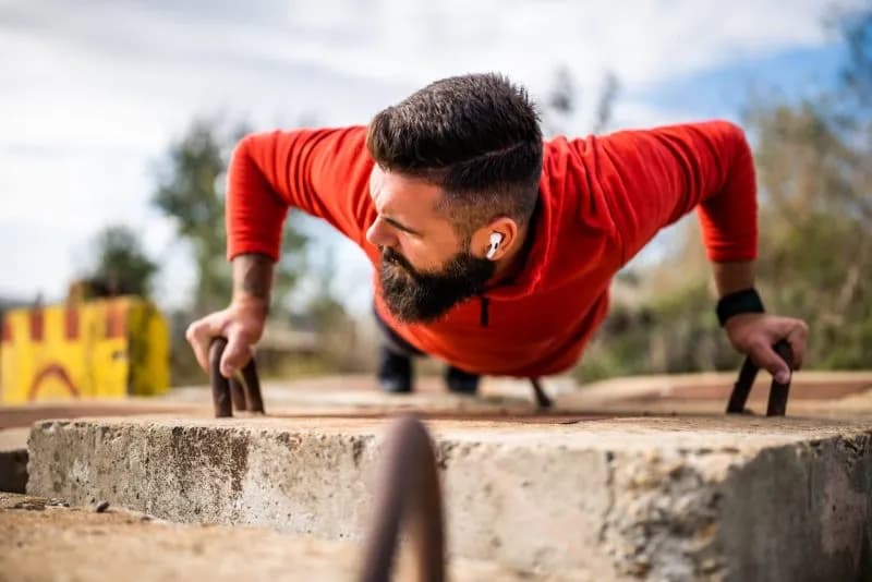 man-doing-pushups-on-concrete-in-sunlight-2026-01-08-07-21-24-utc.jpg