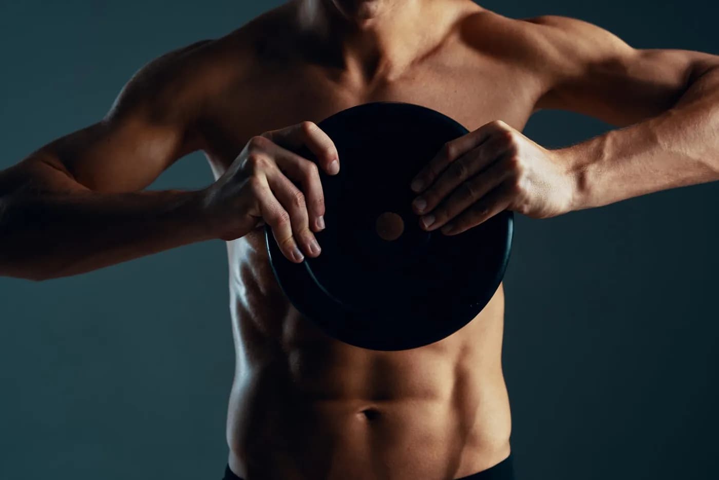 Man performing a core workout for six pack development