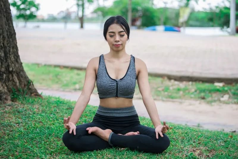 slim girl play yoga on the lawn at the park relax 2026 01 11 10 36 38 utc 1