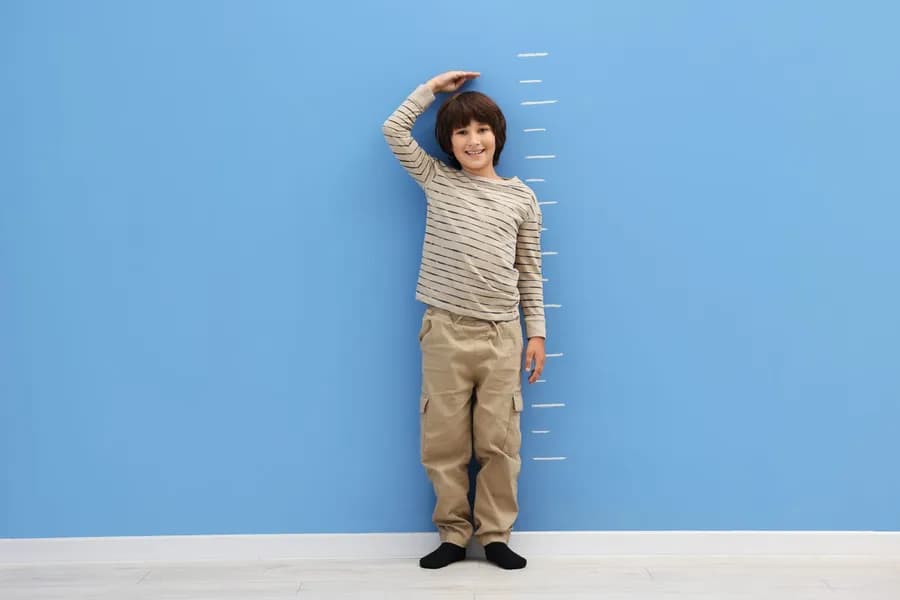 Person performing an exercise to increase height