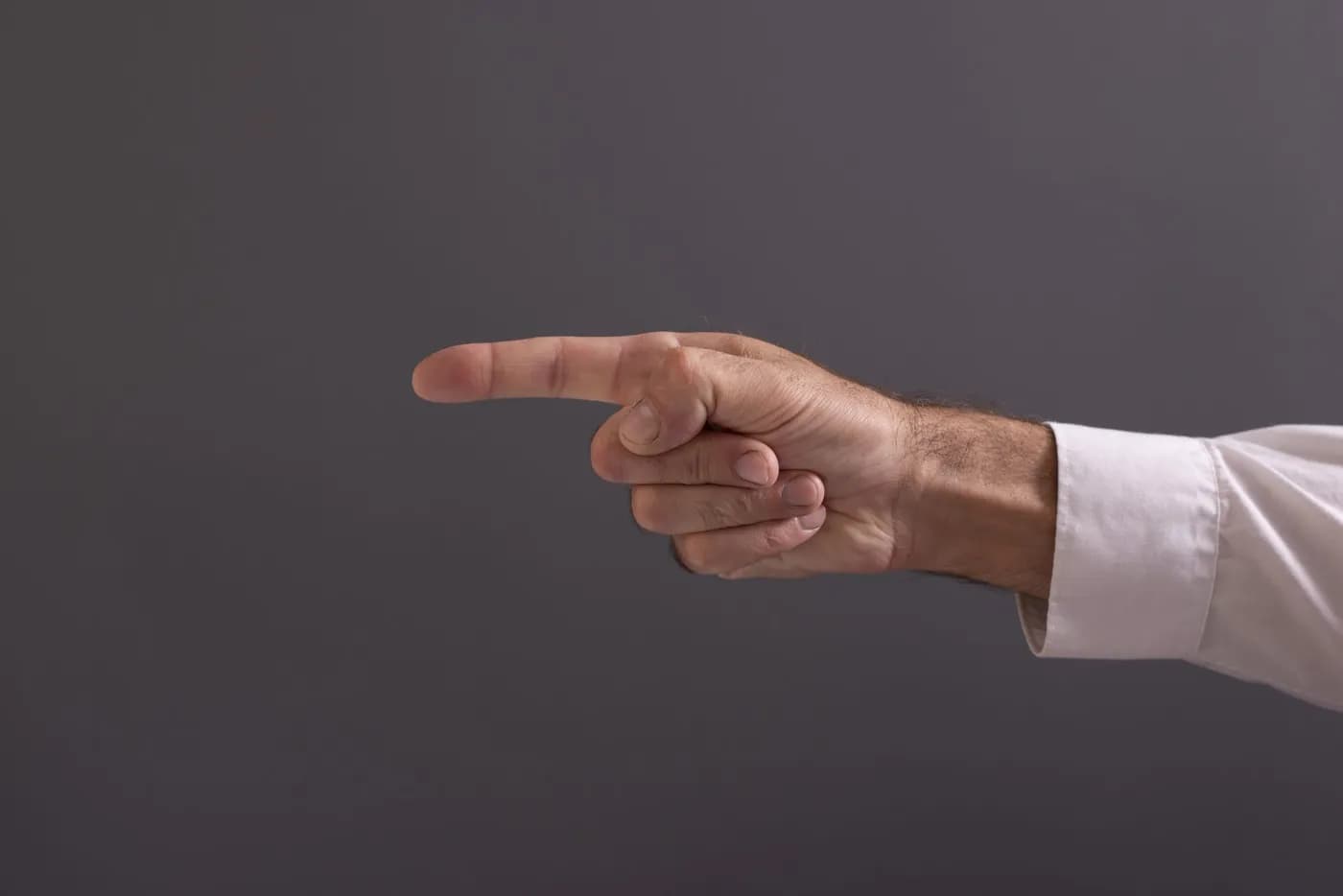 Hand gesture illustrating Vajra Mudra, the thunderbolt yoga hand mudra