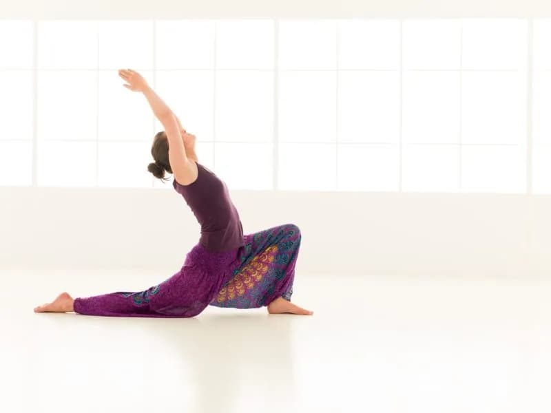 woman practicing yoga in a bright airy room 2026 03 10 01 06 54 utc