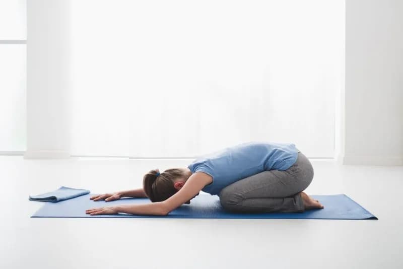 Preparatory yoga stretches before Vajrasana